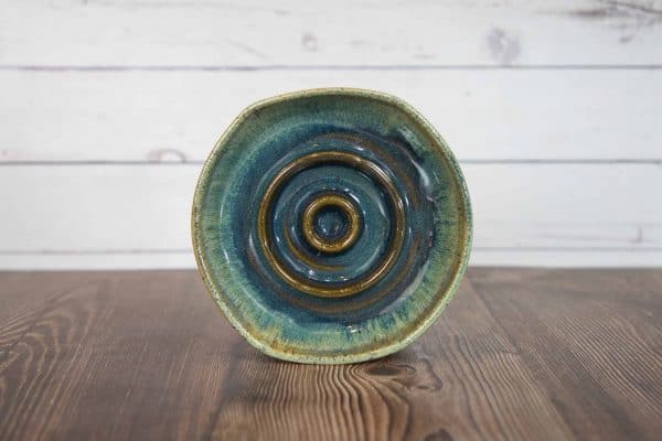 handmade pottery soap dish in brown, blue, and green