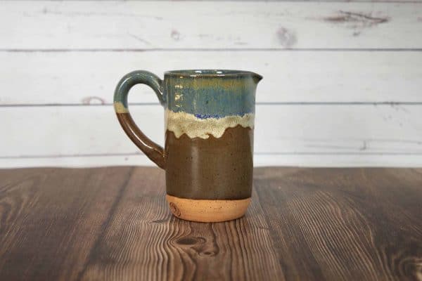 brown and blue handmade small pitcher