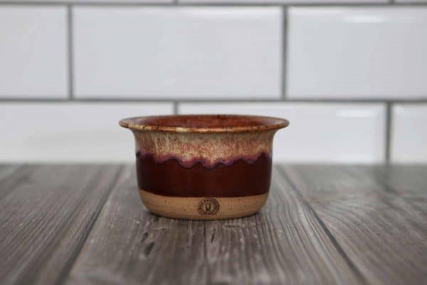 brown and red and cream salsa bowl