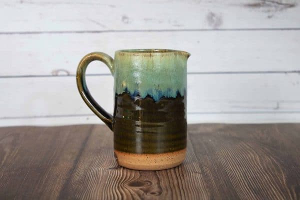 brown and green handmade small pitcher