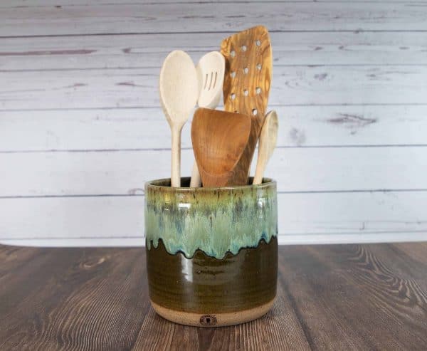 green and brown handmade pottery utensil holder