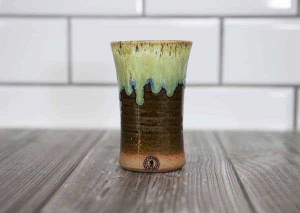 brown and green tumbler