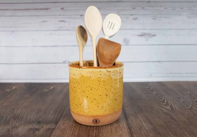 yellow handmade pottery utensil holder