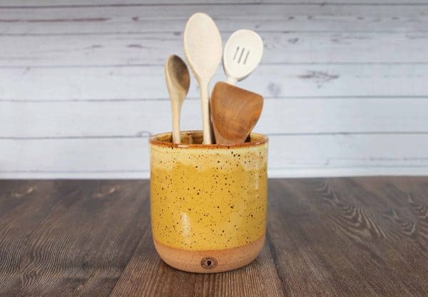 yellow handmade pottery utensil holder