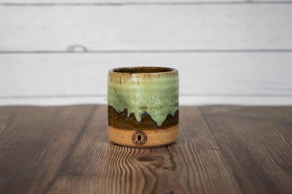 brown and green handmade dented tumbler