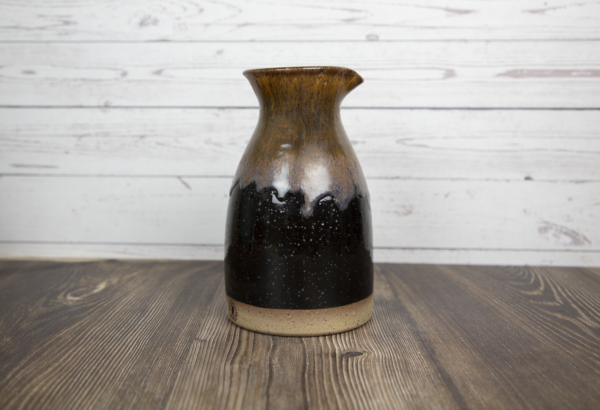 black and brown wine decanter