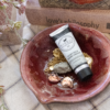 dioni's goat milk hand cream lotion in a jewelry holder