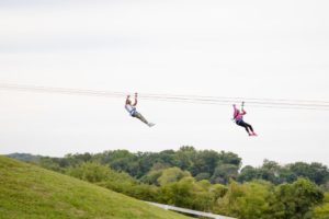 zipliners at five oaks adventure park